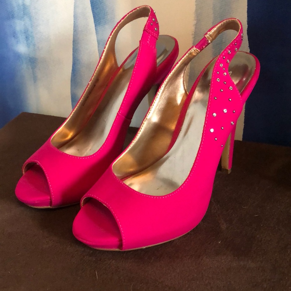 Pink stiletto peep toe shoe